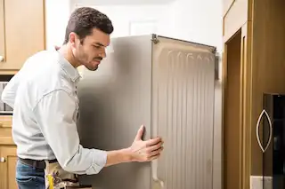 pushing fridge back